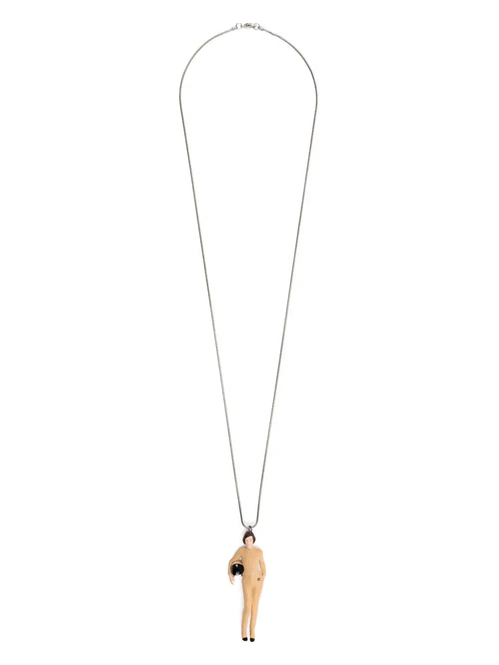Chanel Keira Knightley doll pendant necklace with a gold chain and detailed doll charm, elegant jewelry accessory.