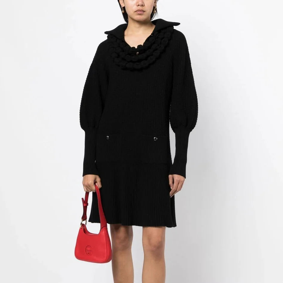 Chanel black textured knit collared dress, stylish and elegant, featuring a fitted silhouette with a classic collar detail.