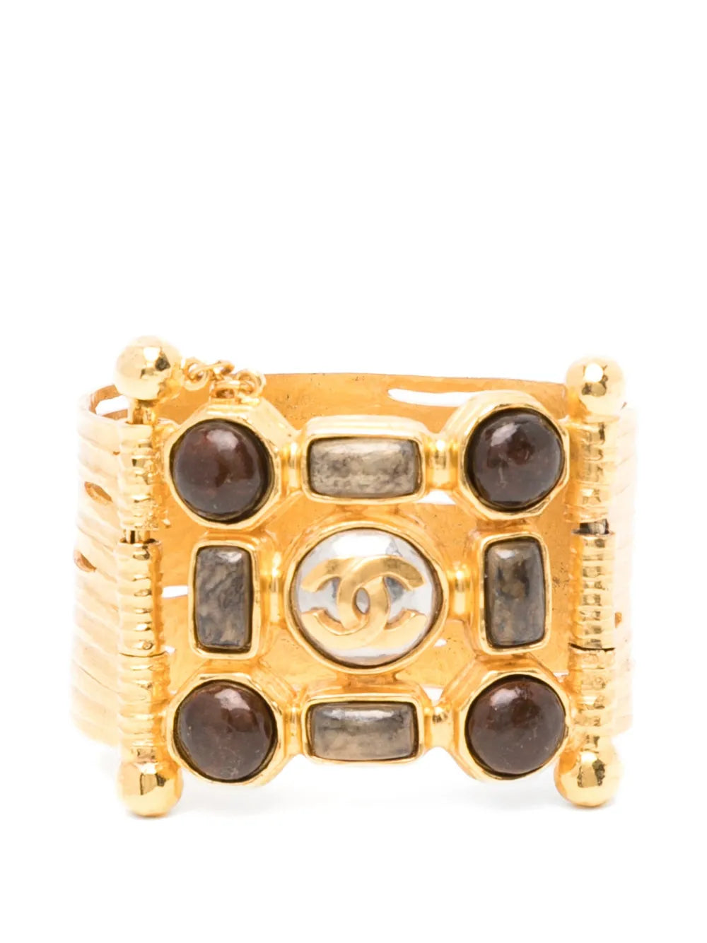 Gold Chanel Gripoix cuff bracelet with intricate glass bead detailing, stylish and elegant jewelry accessory.