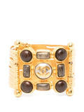 Gold Chanel Gripoix cuff bracelet with intricate glass bead detailing, stylish and elegant jewelry accessory.