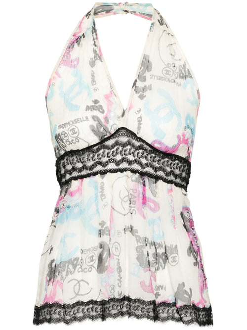 Chanel ivory silk halter neck top from the 2007 Graffiti Line collection, featuring a stylish and elegant design.