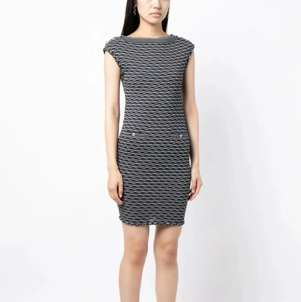 Navy and white Chanel jacquard boat-neck dress with elegant pattern, showcasing a sophisticated, stylish women's dress design.