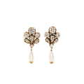 Chanel pearl-effect and crystal earrings with elegant design, showcasing sparkling crystals and lustrous pearl accents.