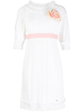 White Chanel Camelia Babydoll Dress, elegant sleeveless dress with delicate lace details and a flowing silhouette.