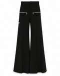 Chloé flared zip trousers featuring high waist, sleek fabric, and stylish design, shown on a model.
