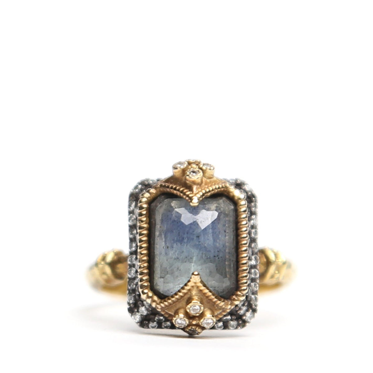 Close-up of a grey rectangular stone and diamond ring by Other Designers, showcasing the elegant design and sparkling accents.