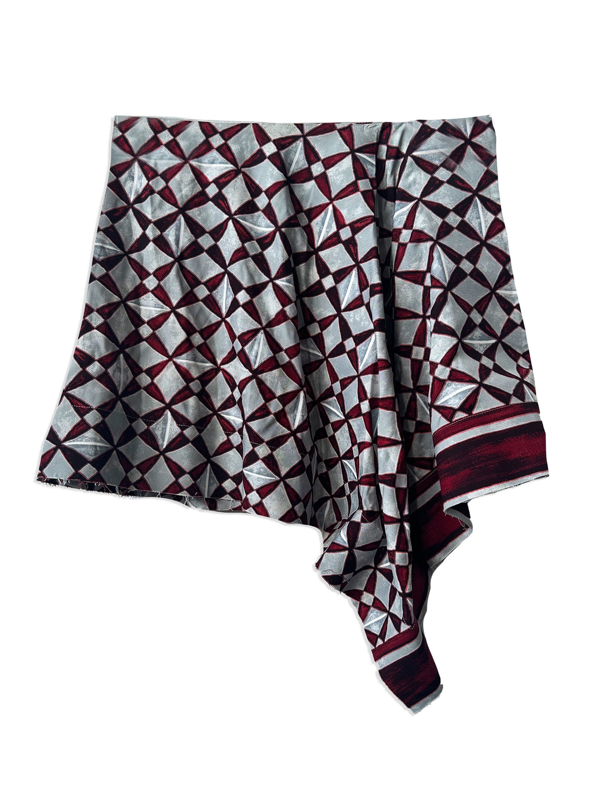 Grey Balenciaga asymmetrical printed skirt with unique draped design, displayed from the front view.