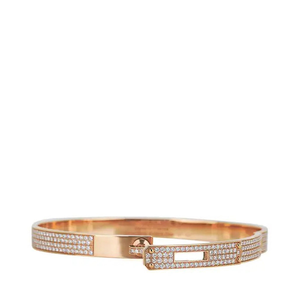 Hermès rose gold diamond Kelly bracelet featuring sparkling diamonds and a sleek, elegant design, shown from the front.