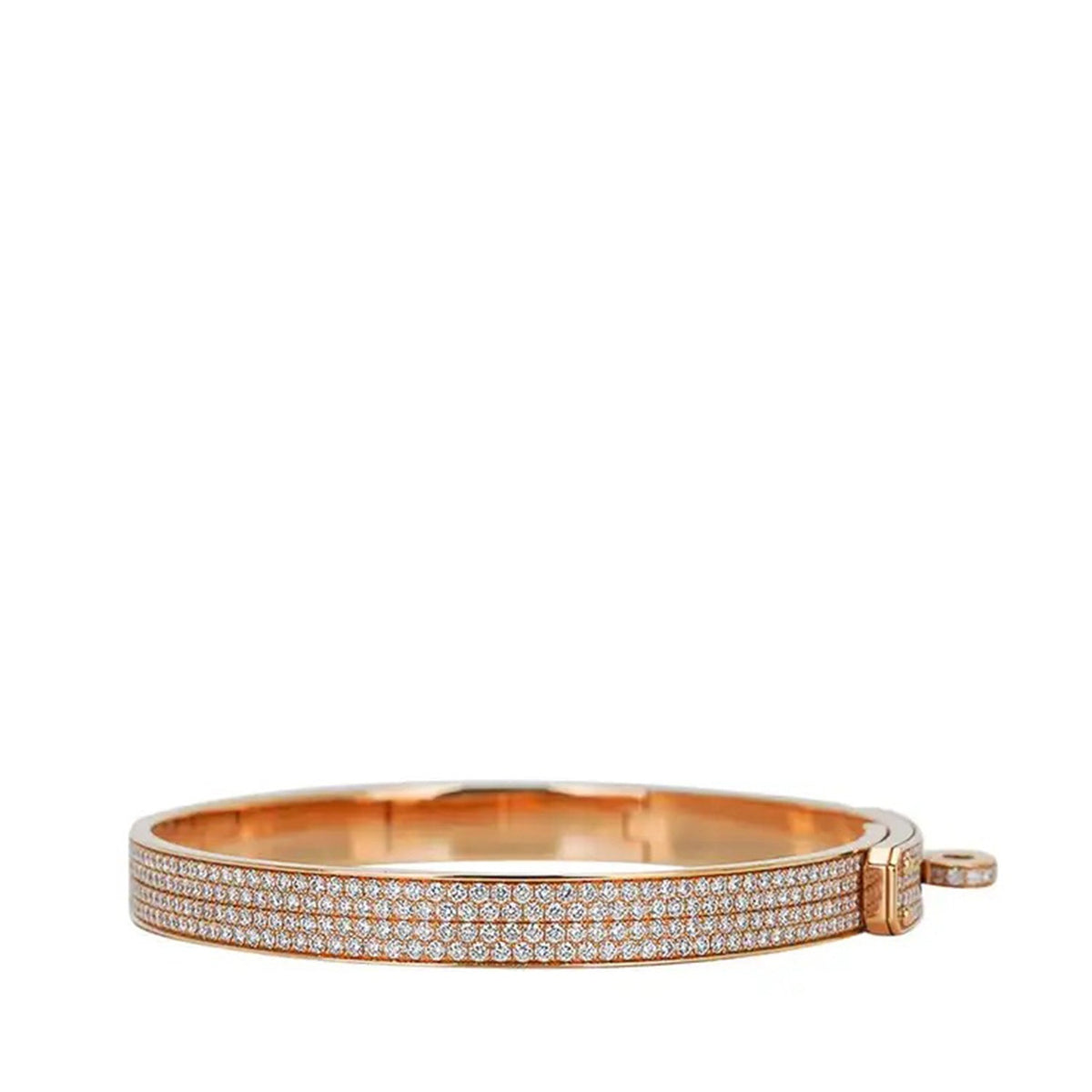 Hermès rose gold diamond Kelly bracelet shown from the side, featuring a sleek design with sparkling diamonds and elegant craftsmanship.