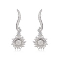 Carrera y Carrera Sol y Sombra diamond sun earrings with sparkling gold and diamond accents, featuring a sunburst design.