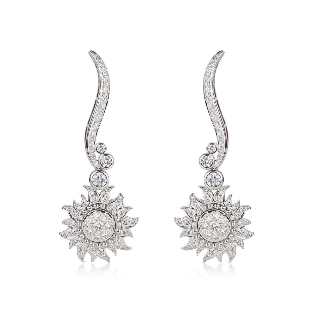 Carrera y Carrera Sol y Sombra diamond sun earrings with sparkling gold and diamond accents, featuring a sunburst design.