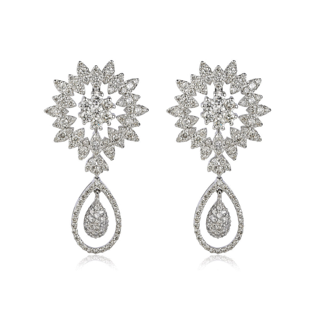 Silver dangle drop diamond earrings by Vintage Finds, featuring sparkling gemstones and elegant design.