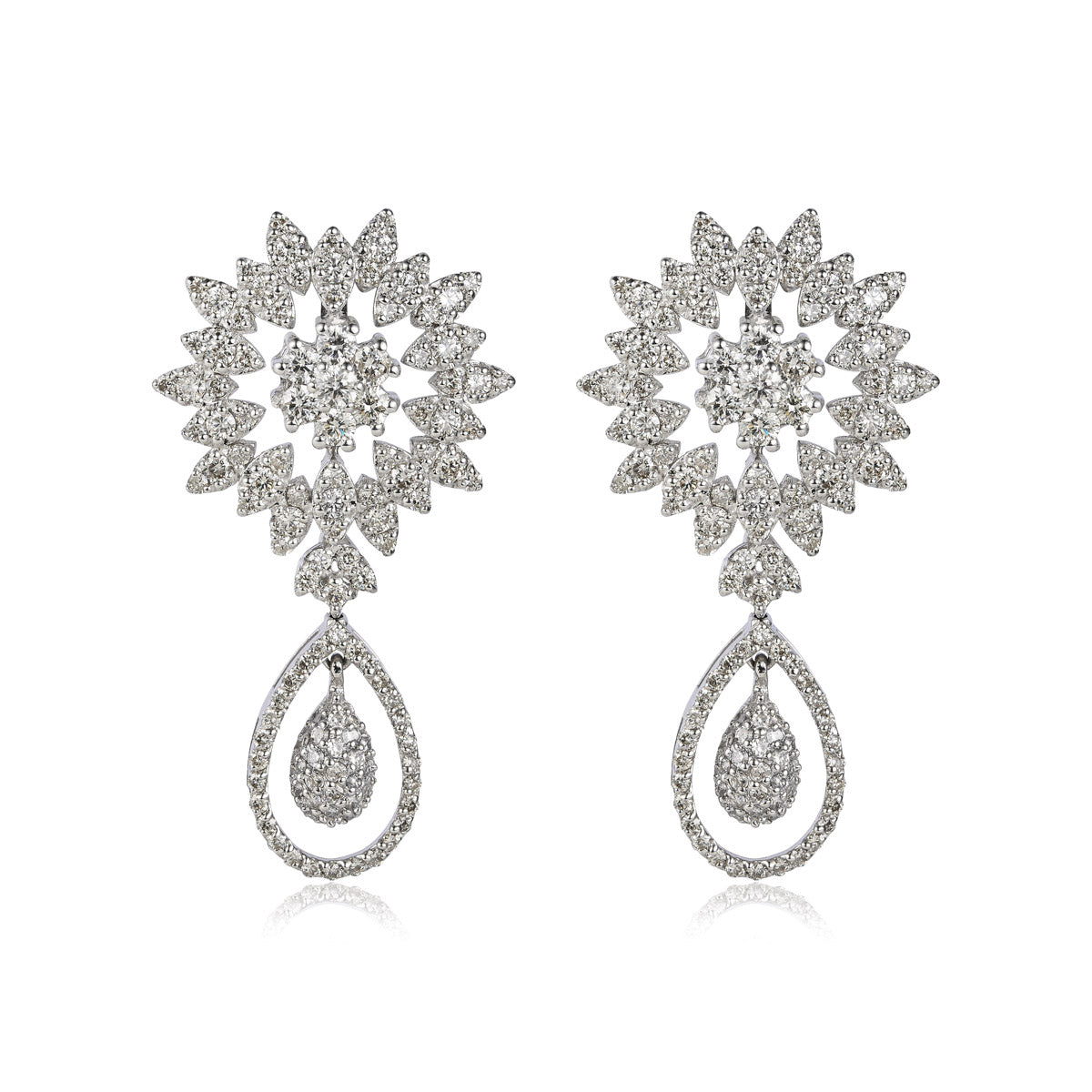 Silver dangle drop diamond earrings by Vintage Finds, featuring sparkling gemstones and elegant design.