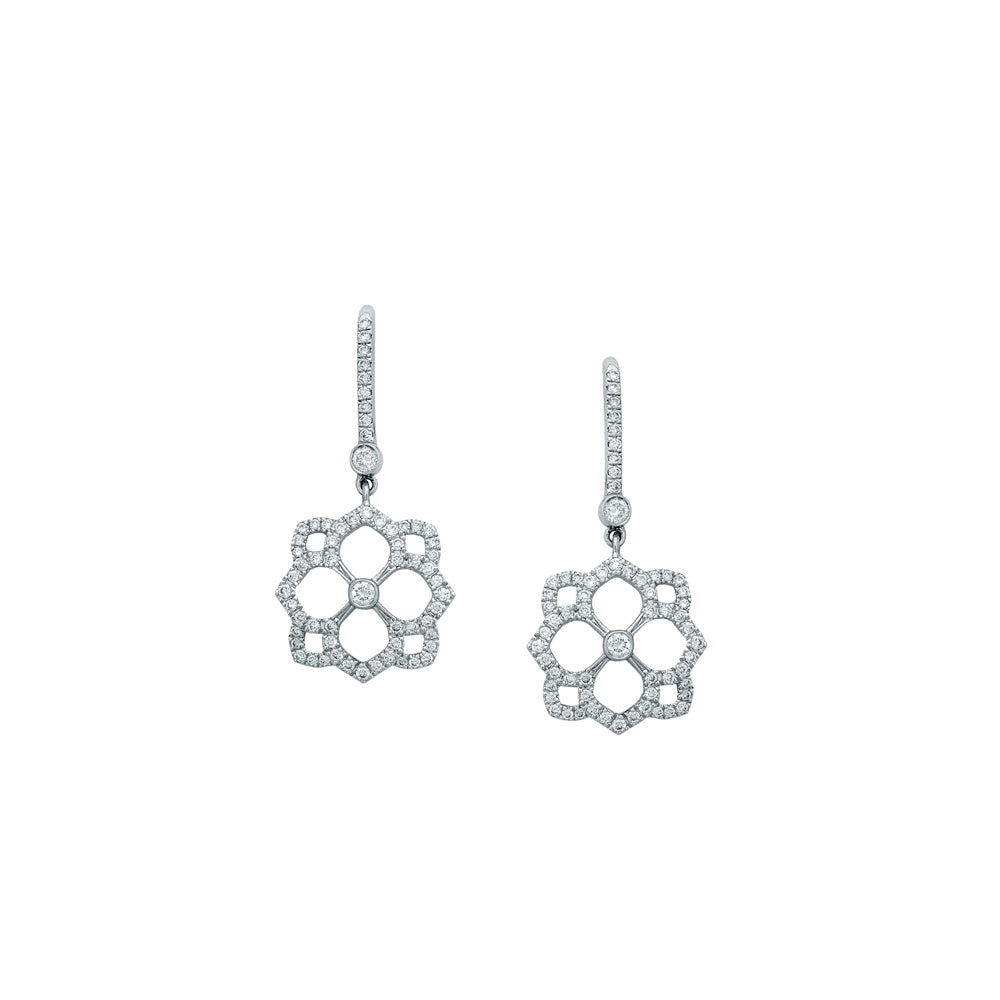 Messika Eden Dormeuse diamond earrings featuring sparkling diamonds set in elegant gold.