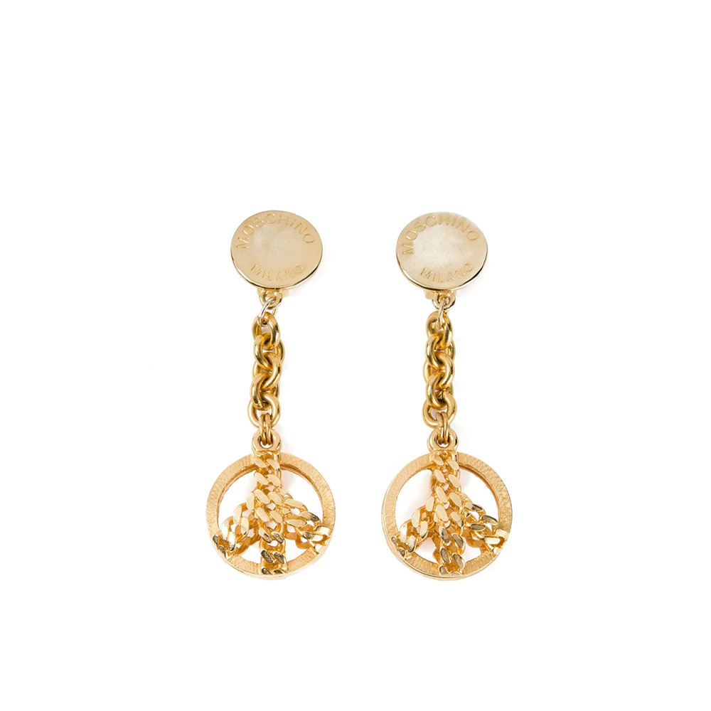 Gold Moschino Peace earrings with bold peace sign design, stylish jewelry accessory for fashionable looks.