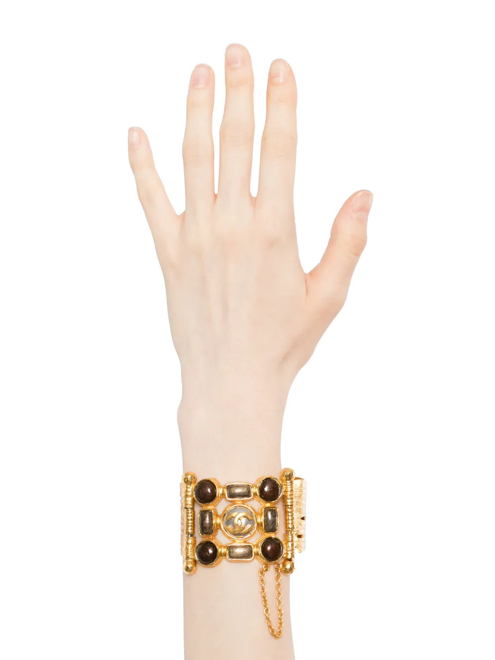 Chanel gold cuff bracelet with Gripoix glass detail, featuring a bold, stylish design for elegant wristwear.
