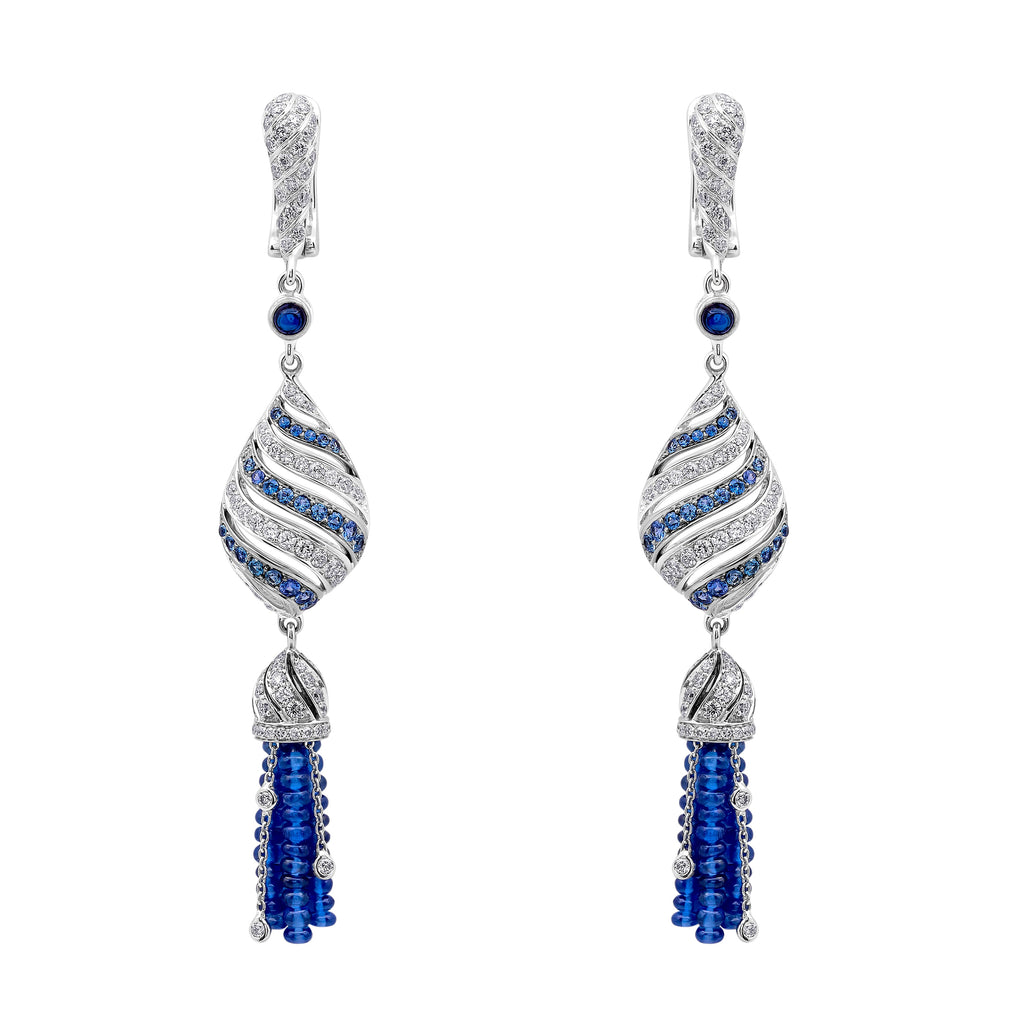 Gilan Blue Sapphire Drop Earrings showcasing blue sapphires set in elegant earrings with a silver finish.