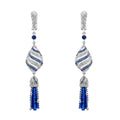 Gilan Blue Sapphire Drop Earrings showcasing blue sapphires set in elegant earrings with a silver finish.