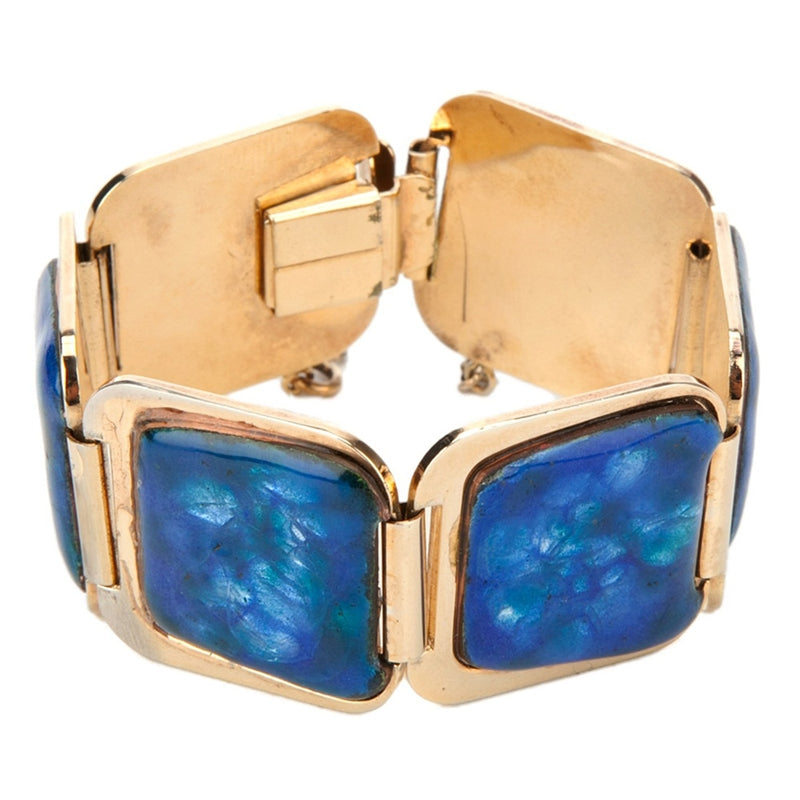 Vintage 1970s bracelet from Vintage Finds featuring retro design and metallic finish, displayed on a neutral background.