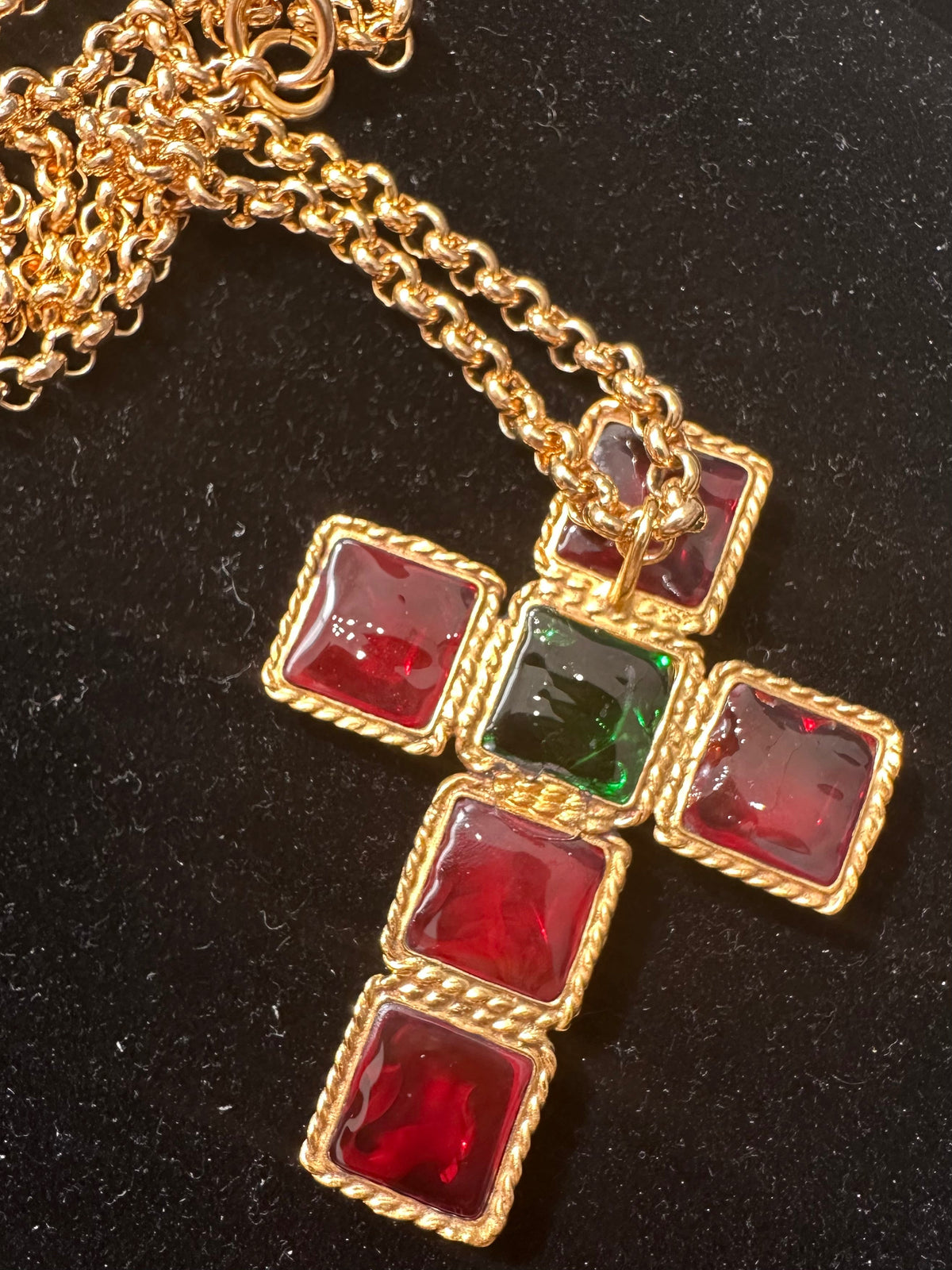 Vintage Finds Gripoix cabochon cross motif necklace featuring colorful glass stones and a gold-tone chain.