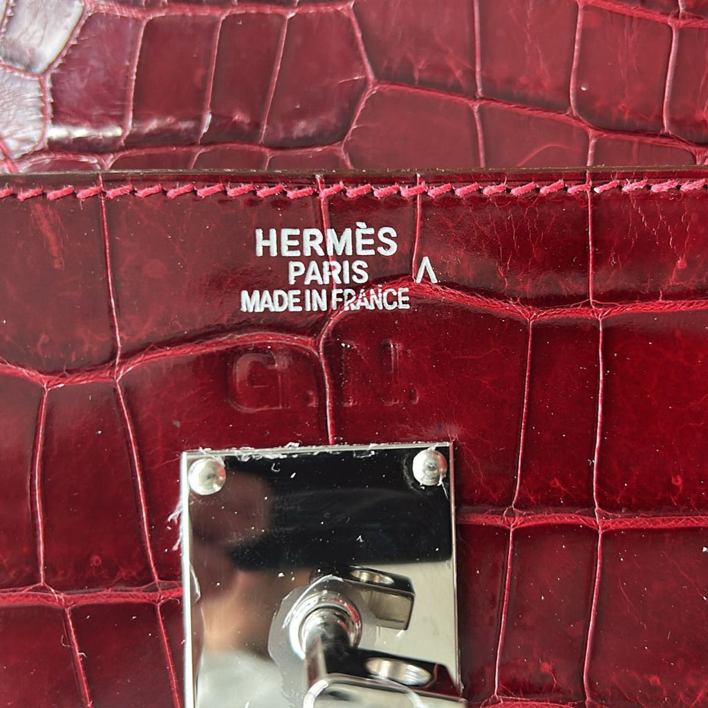 Hermès JPG Shoulder Birkin 42 Red Porosus PHW leather shoulder bag with top handles and gold hardware.