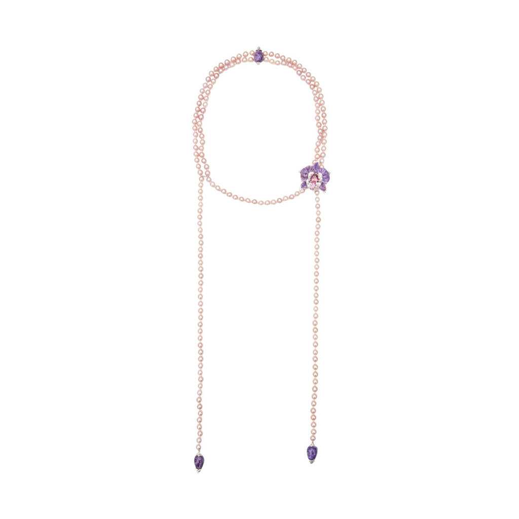 Cartier pearl necklace with amethyst pendant, elegant fine jewelry featuring lustrous pearls and a purple amethyst gemstone.