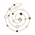 Van Cleef & Arpels Magic Alhambra long necklace with gold clover motifs and elegant design in fine jewelry style.