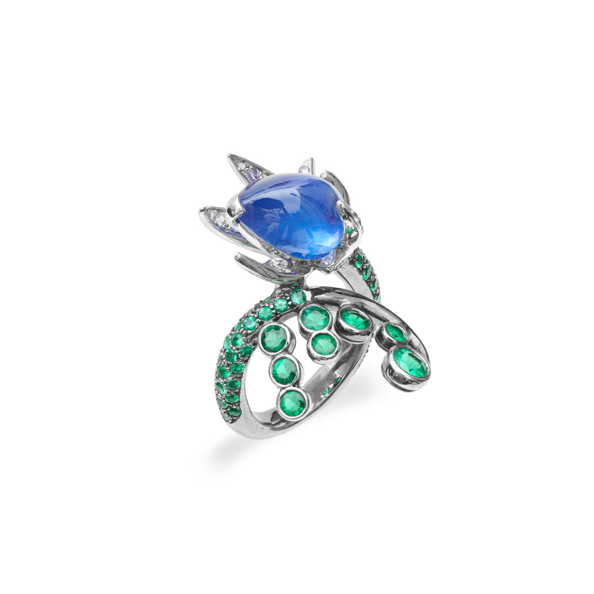 Boucheron sapphire and emerald ring with gold band showcasing vibrant gemstones and intricate jewelry design.