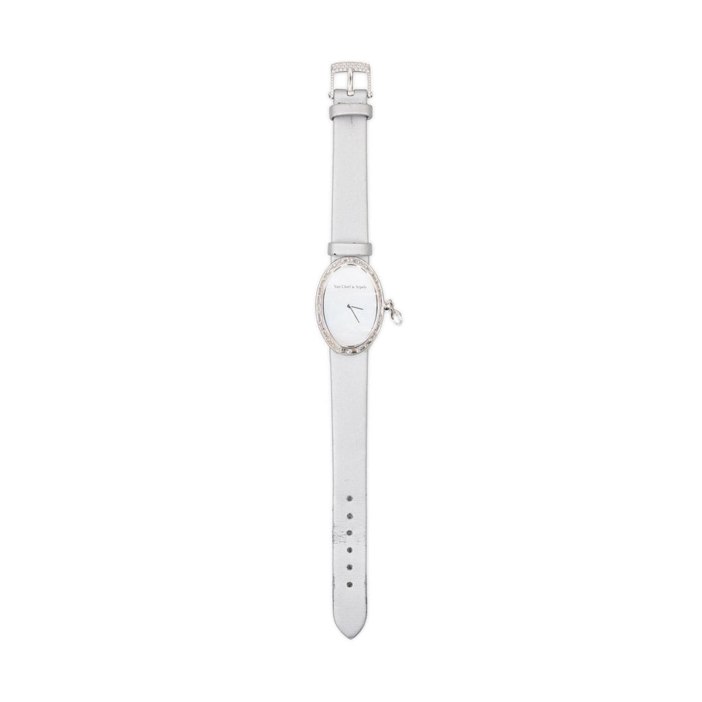 Van Cleef & Arpels gold briolette diamond pavé charms for watches, featuring intricate detailing and sparkling gemstone accents.