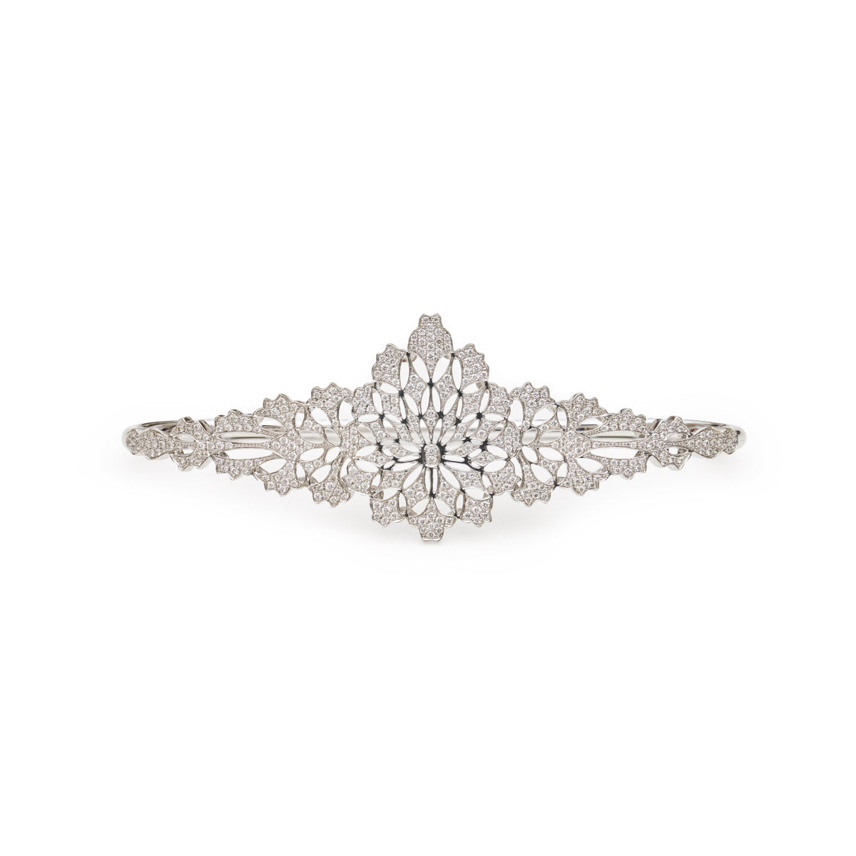 Elegant white gold palm bracelet from Other Designers fine jewelry collection, featuring intricate design details.