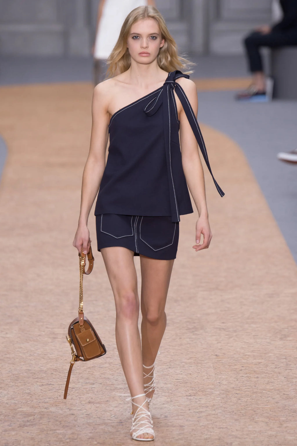 Chloé SS16 navy mini skirt featuring a fitted waist and stylish hemline, perfect for casual or dressy looks.