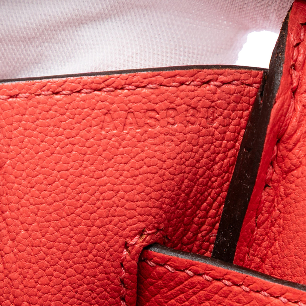 Hermès Birkin 35 Retourne Epsom PHW top handle bag in light-colored leather, featuring sturdy handles and elegant design.