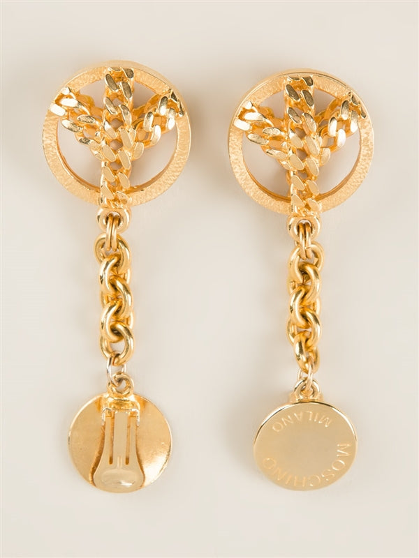 Moschino Peace earrings featuring bold, artistic design with peace symbol accents, crafted by Other Designers.
