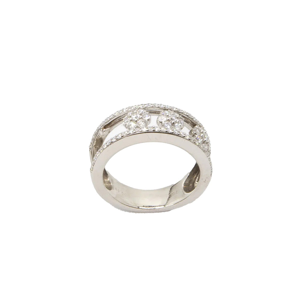 Messika Diamond Floral Ring featuring intricate floral design with sparkling diamonds on a sleek band.