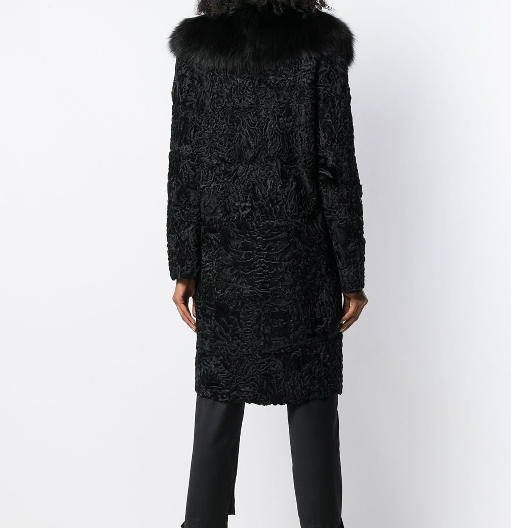 Black Prada Jacquard Astrakhan coat with textured woven fabric and classic tailored design, displayed on a hanger.