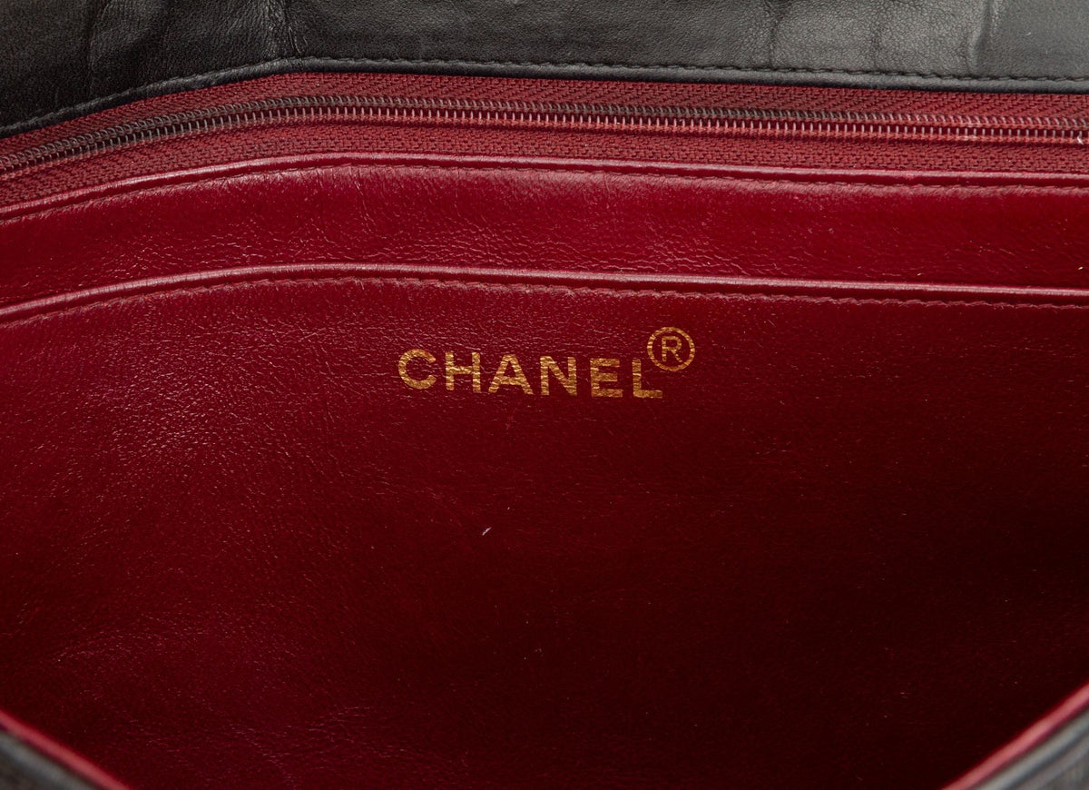 Chanel Jumbo Black 24kt Logo Flap Bag