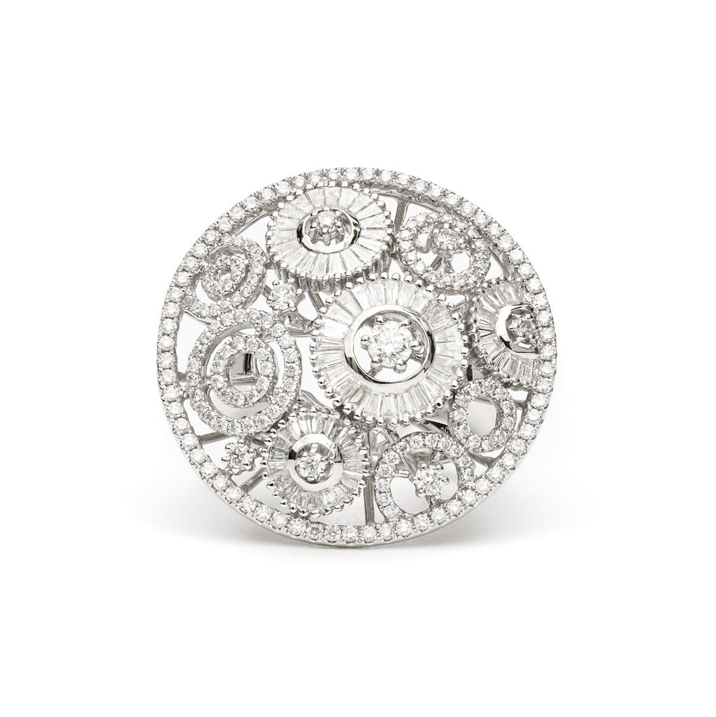 Vintage Finds round ornate diamond ring featuring intricate design and sparkling diamonds in a classic jewelry style.