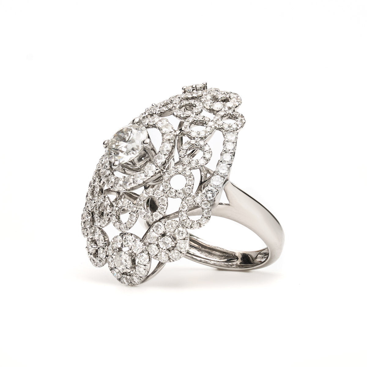 Vintage Finds ornate cluster diamond ring featuring multiple sparkling diamonds set in a detailed gold band.