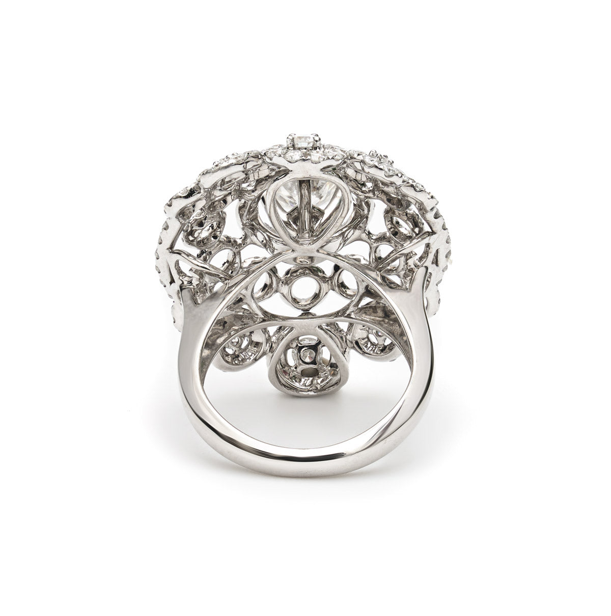 Vintage Finds ornate cluster diamond ring featuring multiple sparkling diamonds set in a detailed gold band.