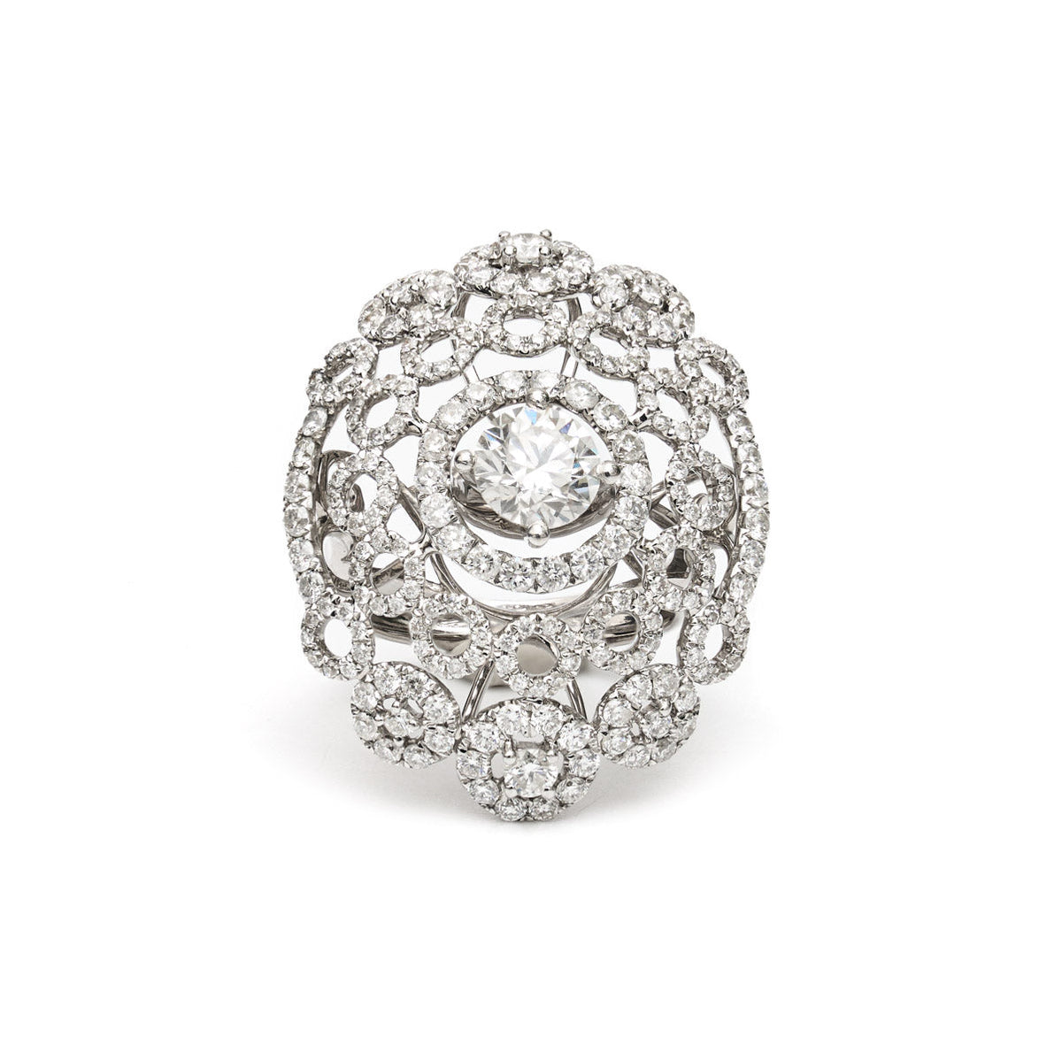 Vintage Finds ornate cluster diamond ring featuring a detailed design with sparkling diamonds and a gold band.