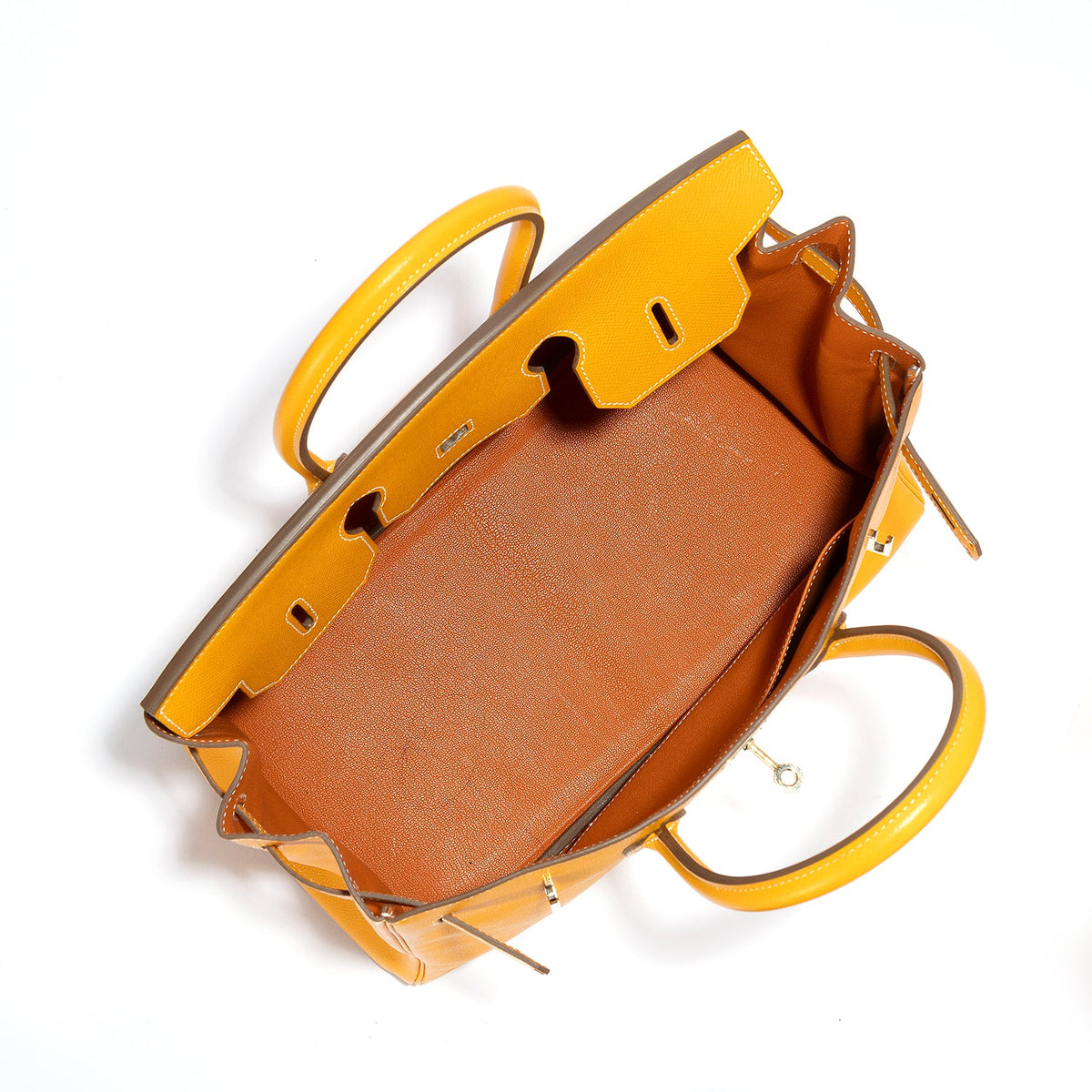Hermès Birkin 35 Top Handle Bag in Jaune D'or and Potiron Candy Epsom leather, showcasing its luxurious design and vibrant colors.