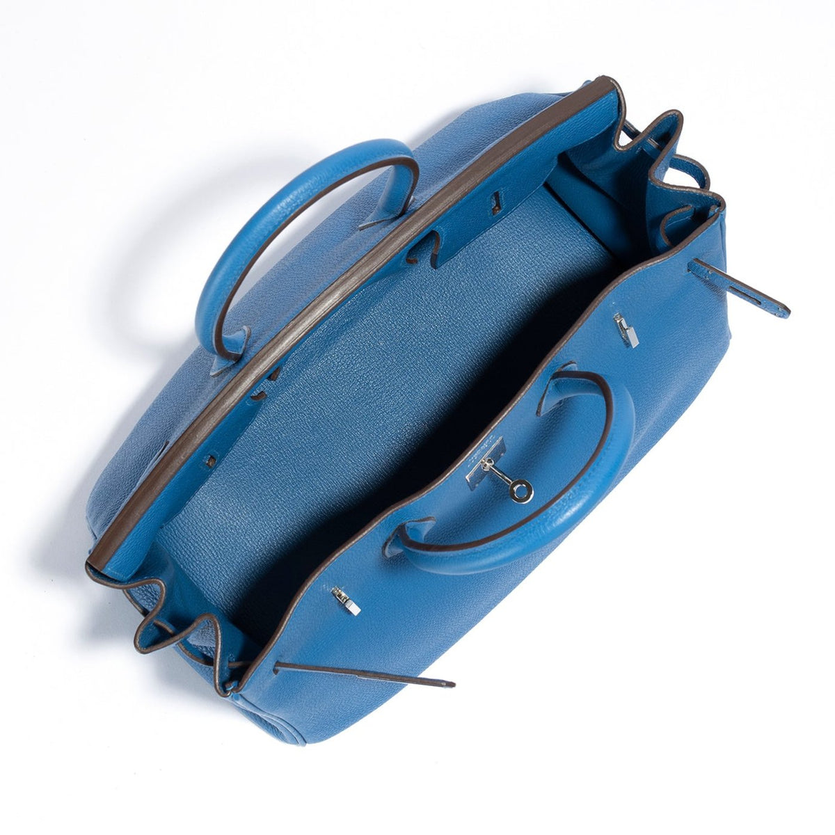 Hermès Birkin 35 Blue Mykonos Epsom top handle bag with palladium hardware, showcasing its elegant design and luxurious leather texture.