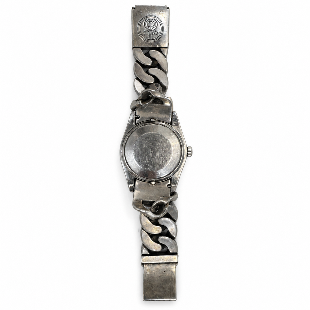 Rolex x Loree Rodkin luxury watch with a sleek design, featuring a gold-tone case and elegant dial, showcasing high-end craftsmanship.