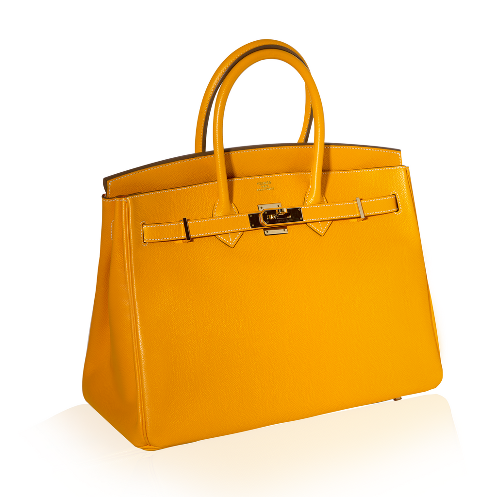 Hermès Birkin 35 Top Handle Bag in Jaune D'or and Potiron Candy Epsom leather, showcasing luxurious craftsmanship.