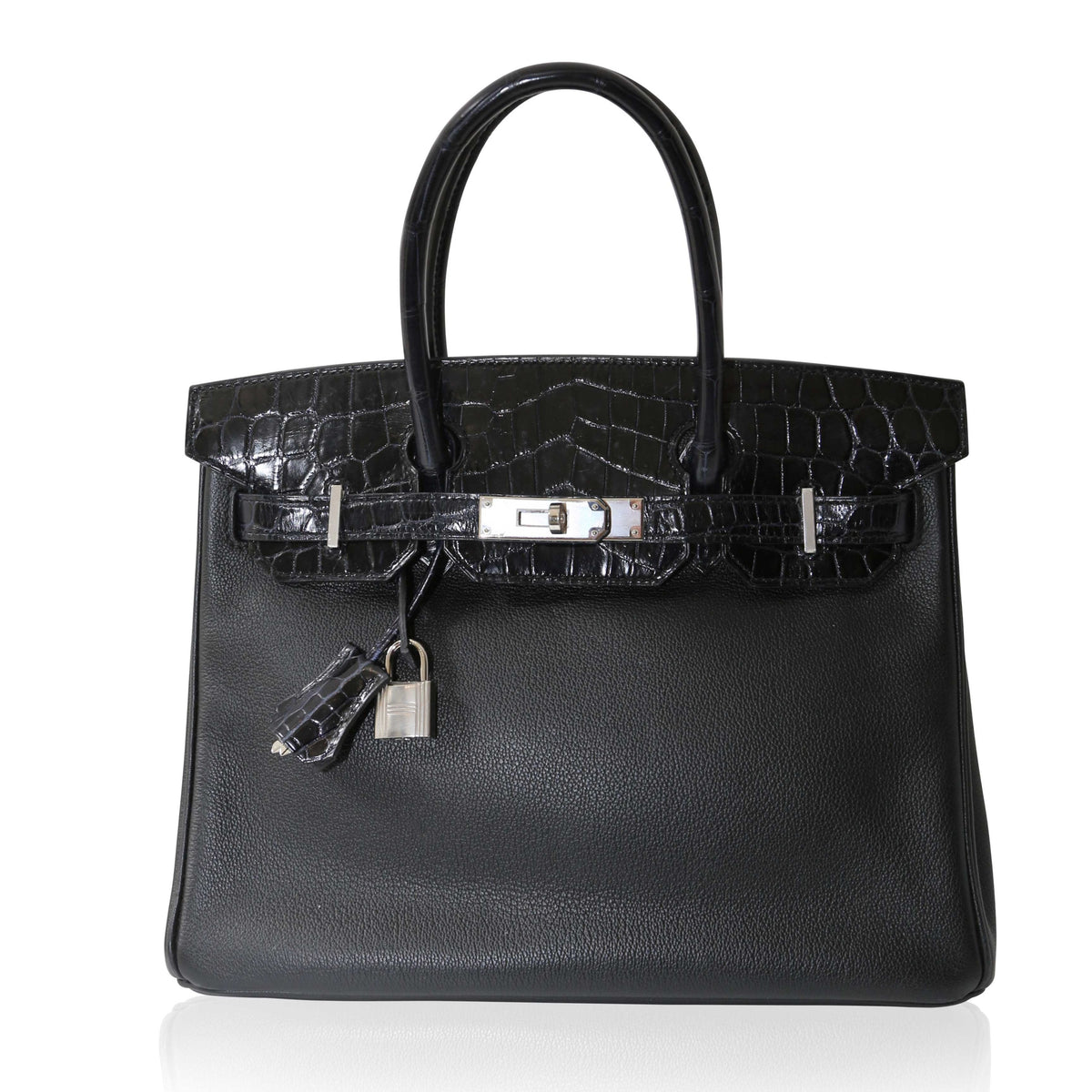 Hermès Touch Birkin 30 top handle bag in smooth leather with gold hardware, showcasing its elegant design and craftsmanship.