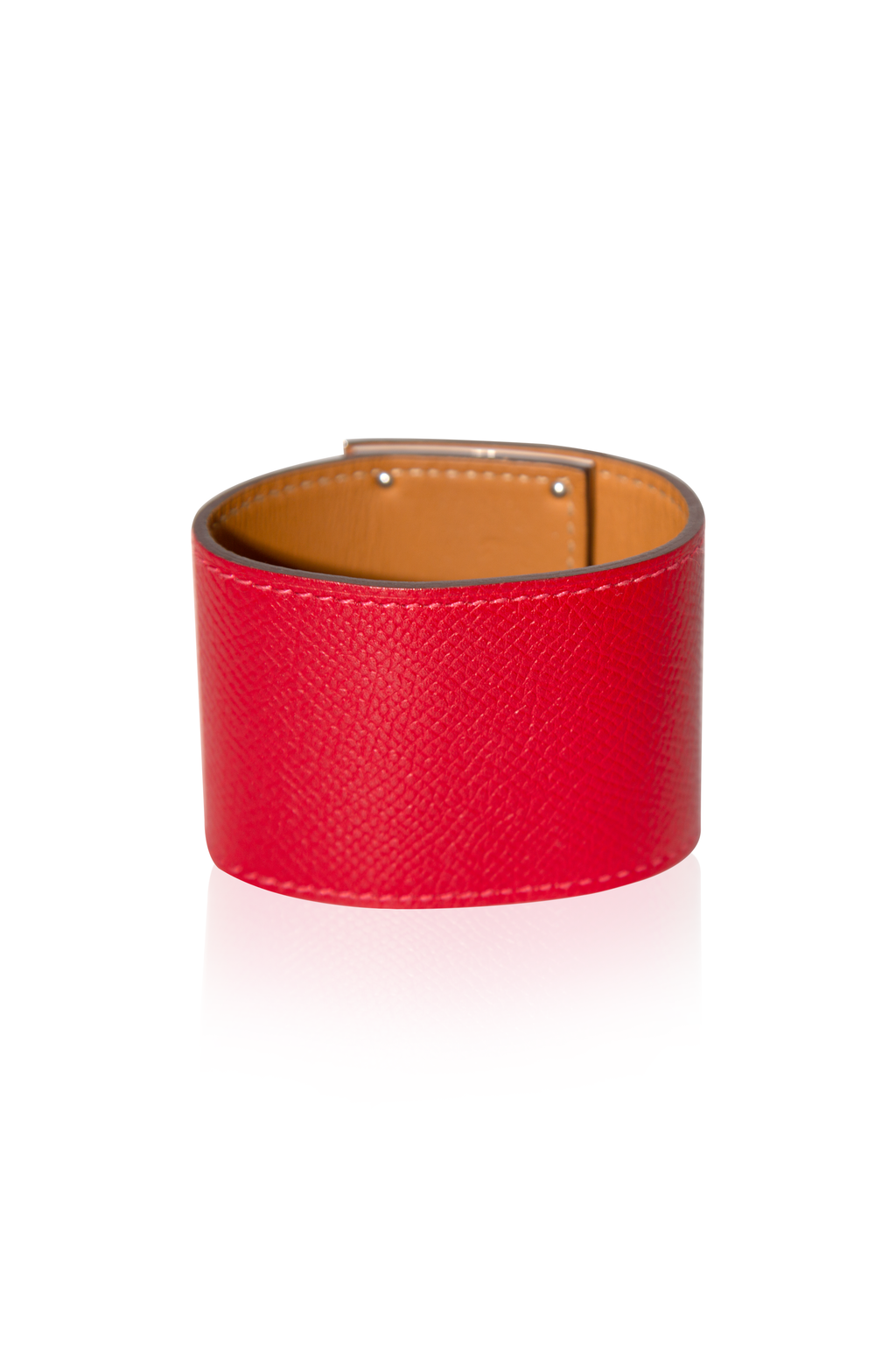 Hermès Kelly Dog Extreme bracelet in red Epsom leather featuring a distinctive dog-shaped charm.