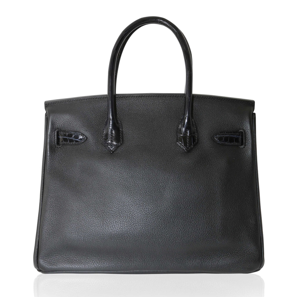 Hermès Touch Birkin 30 top handle bag in SS03 leather with gold hardware, showcasing its luxurious design and craftsmanship.