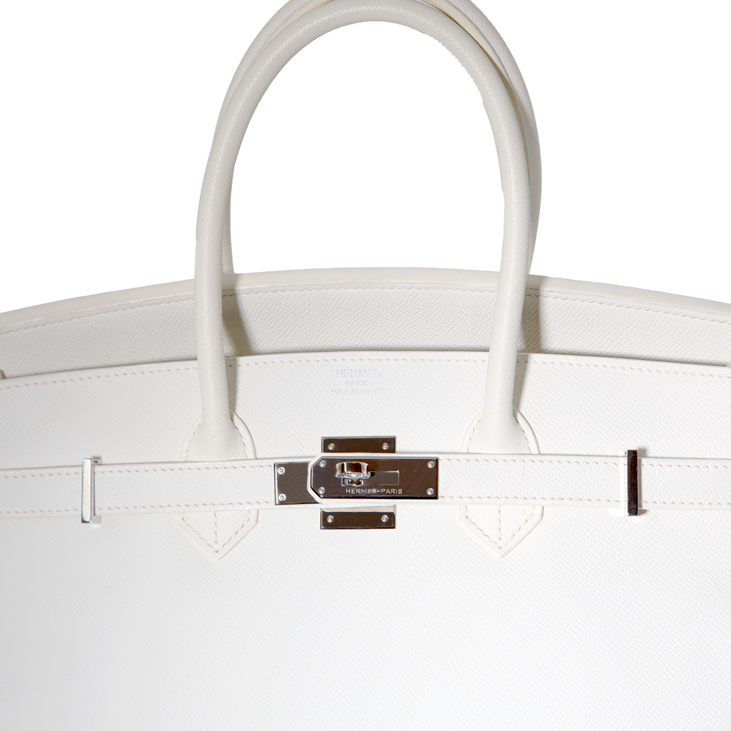 Hermès Birkin 35 White Epsom Top Handle Bag with gold hardware, showcasing its elegant design and structured shape.