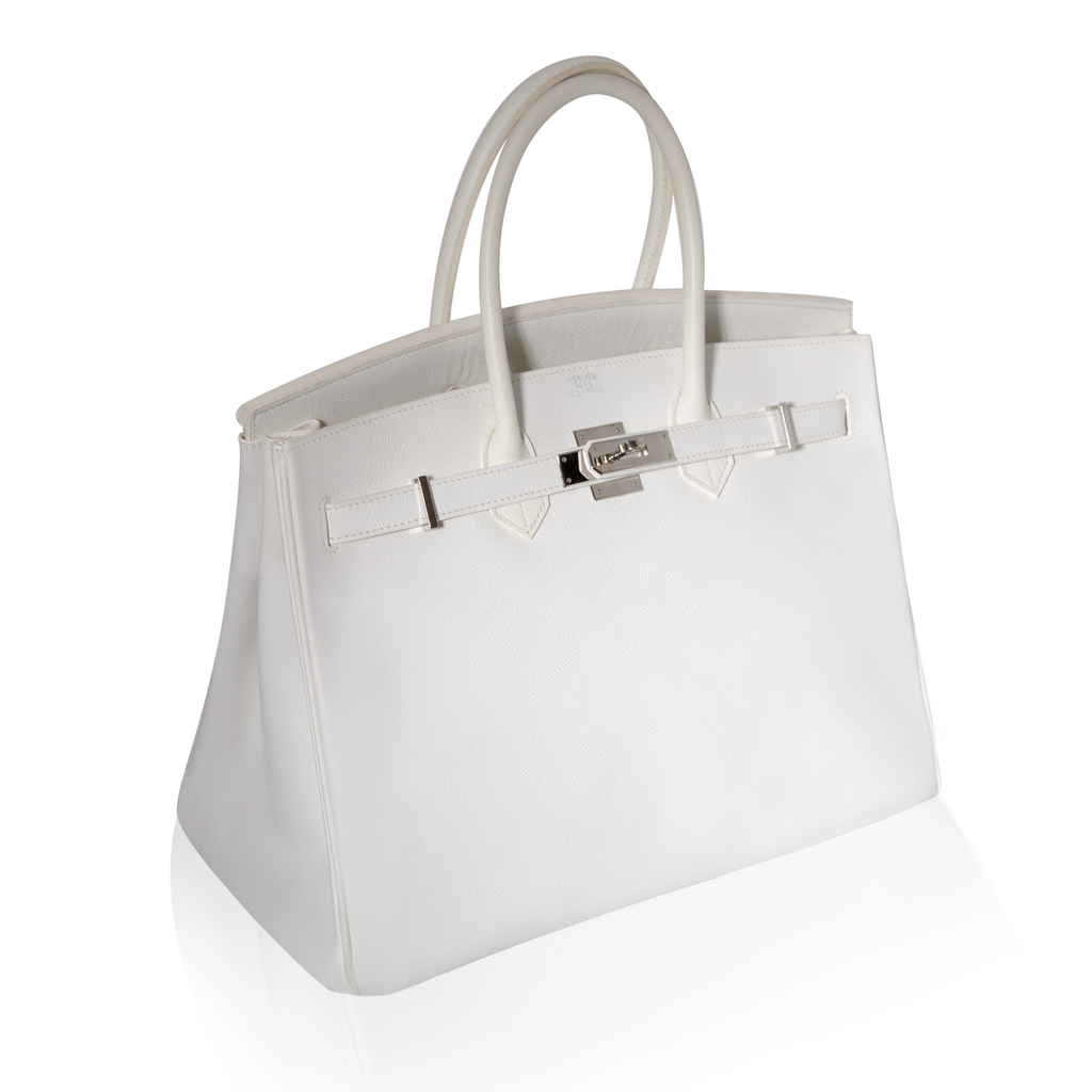 Hermès Birkin 35 White Epsom leather top handle bag with gold hardware, showcasing its elegant design and structured shape.