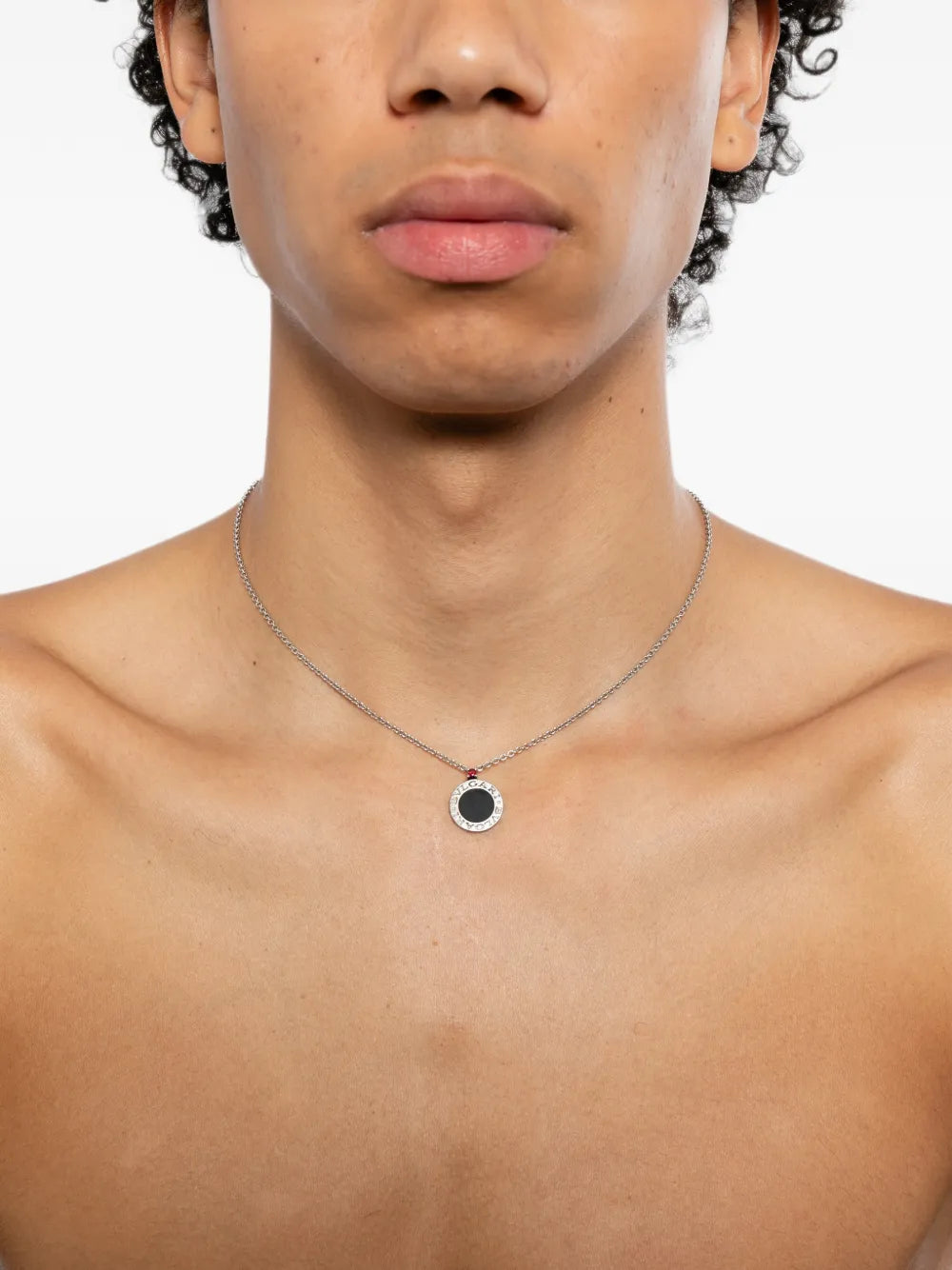Bulgari silver necklace with onyx pendant featuring a Save the Children logo for charity jewelry.